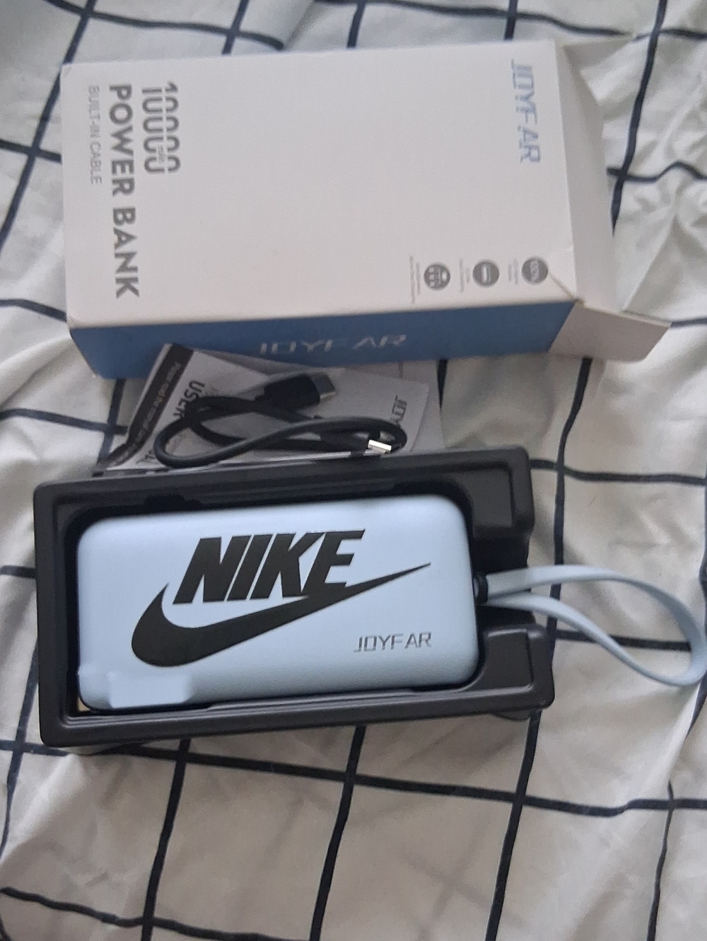 Nike Light Blue Portable Power Bank with Black Logo